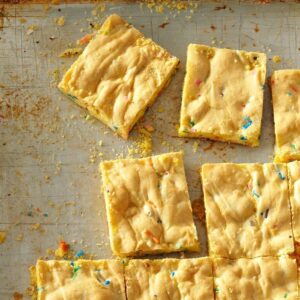 Golden cookie bars with sprinkles and white chocolate chips