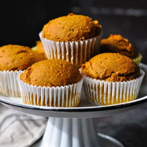 pile of pumpkin muffins on a dish