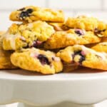 A cake platter topped with the bite size treats.