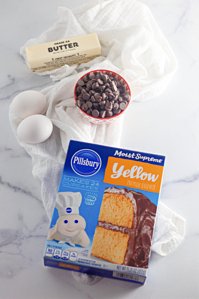 Ingredients need to make Chocolate Chip Cake Mix Cookie Bars. 