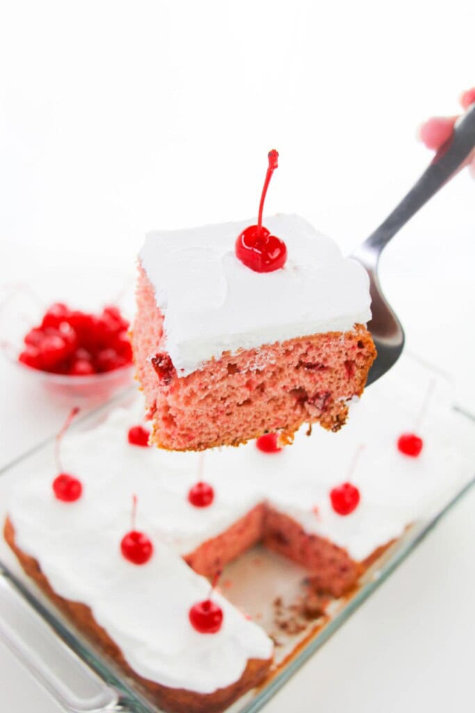 Serving up a piece of the dessert.