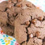 Two candy stuffed chocolate cookies.