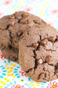 Two candy stuffed chocolate cookies.