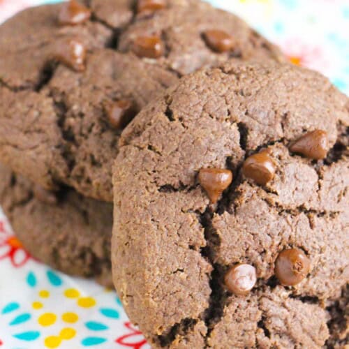 Two candy stuffed chocolate cookies.