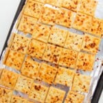 A baking sheet with the snack on them.