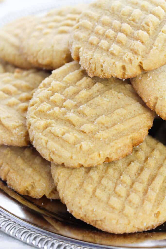 Cake mix peanut butter cookies on a white plate.