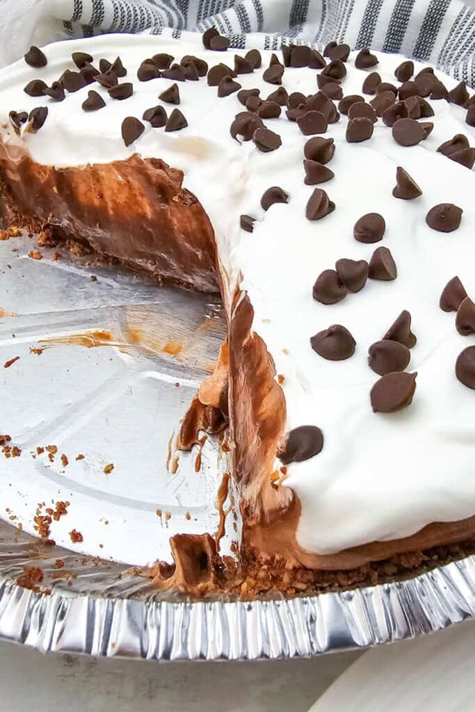 A dish of the dessert with a slice out.