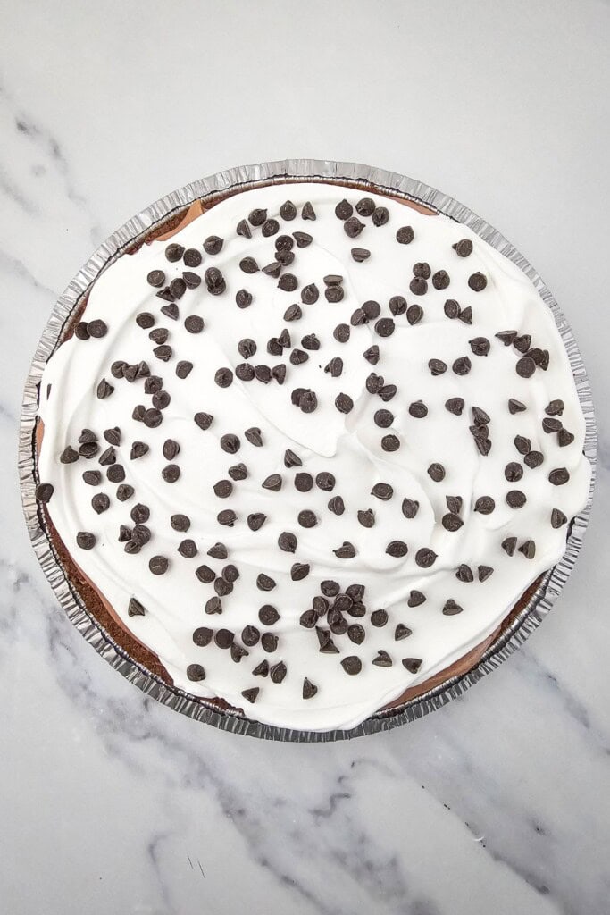 A whole chocolate cream pudding pie.