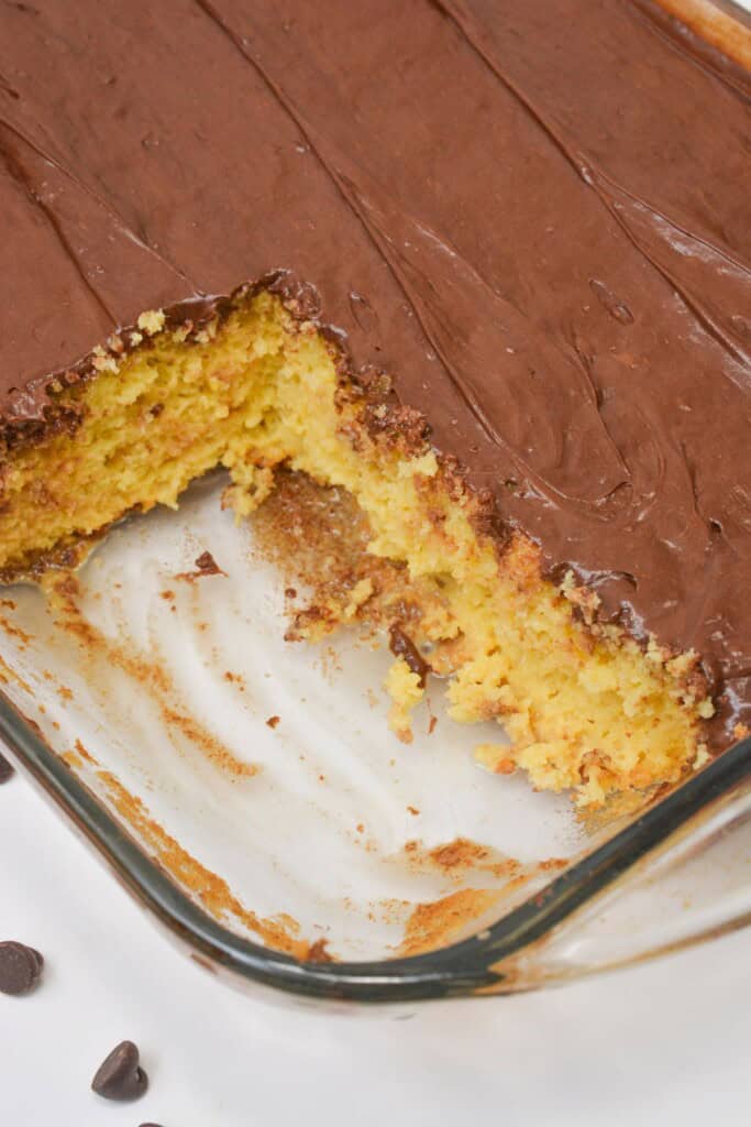 The baking dish with a slice taken out.