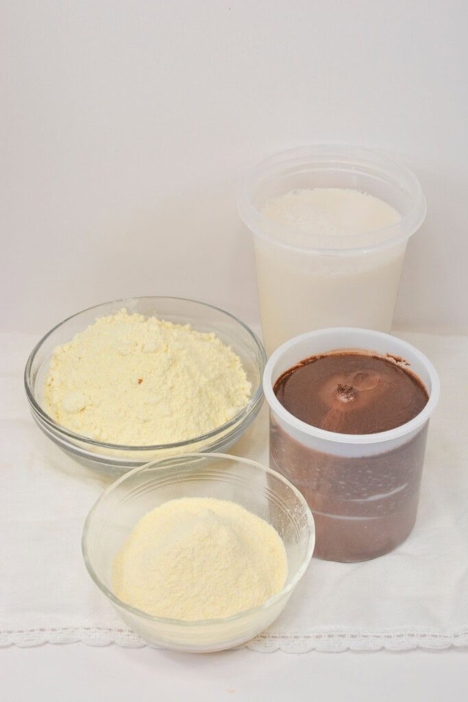 The baking mix, chocolate and pudding in glass jars.