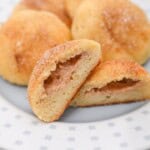 A plate of the finished biscuits with one cut open.