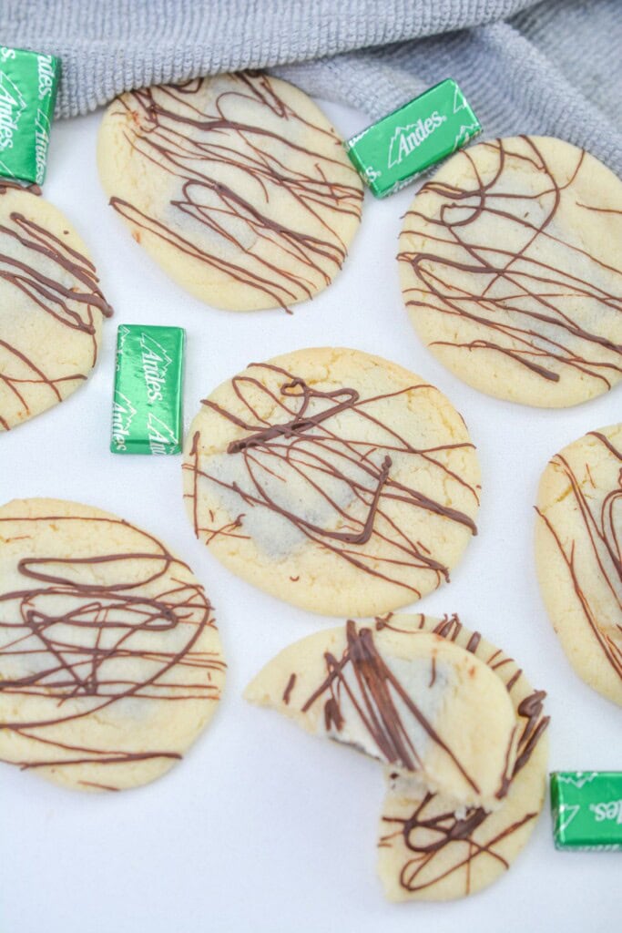 A candy sitting on a finished tray of the cookies.