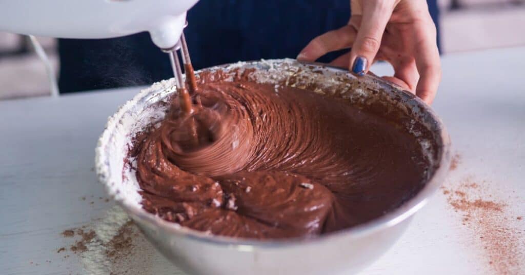 handmixer mixing chocolate brownies
